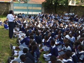 Coporal Beth Kamau from Kaptembwo Police Station gender desk during sensitisation forum on violence prevention at Koinange Primary School.